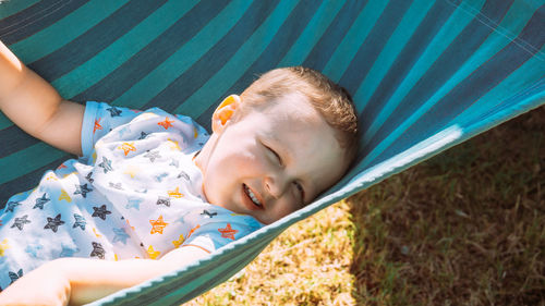 High angle view of boy sleeping