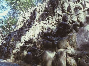 Close-up of rock formation in water