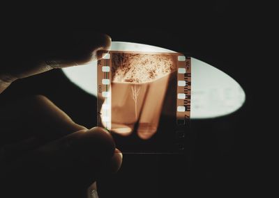 Close-up of hand holding glass