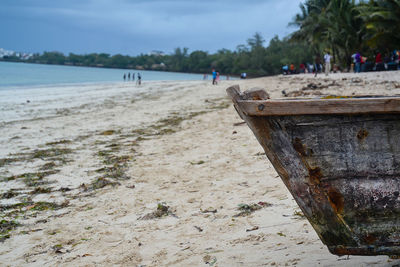 Cropped image of boat at beach