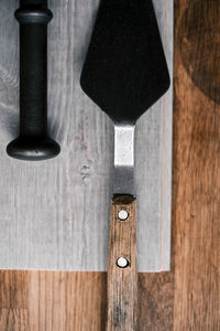 High angle view of equipment on wooden table