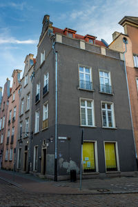 Low angle view of old building against sky