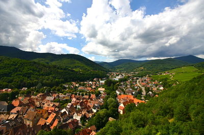 High angle view of houses against cloudy sky