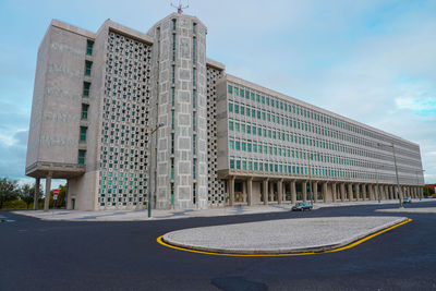 Low angle view of modern buildings against sky