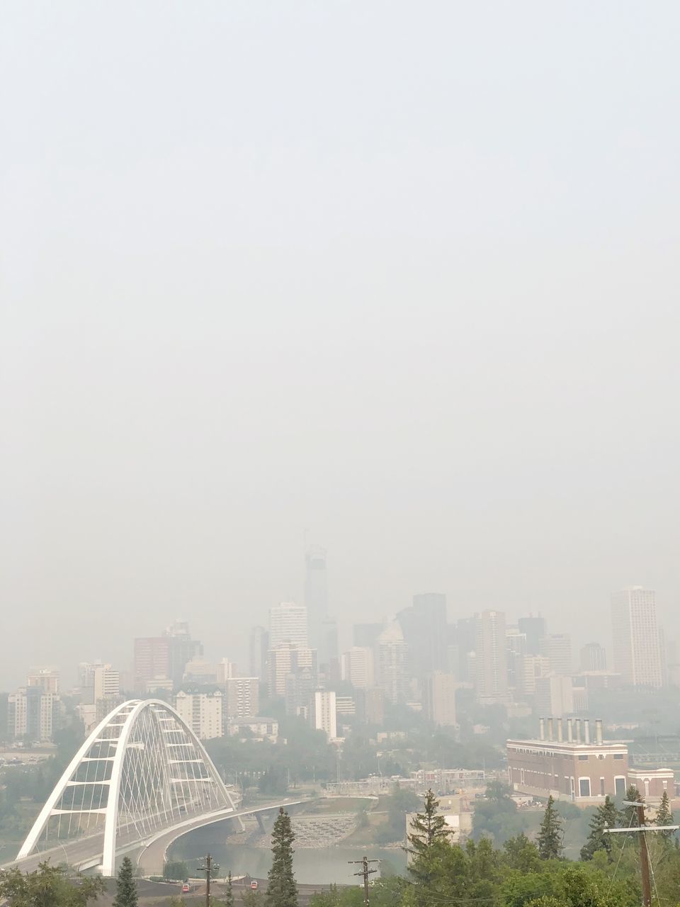 architecture, built structure, building exterior, city, sky, cityscape, nature, copy space, building, no people, office building exterior, fog, travel destinations, day, skyscraper, outdoors, arts culture and entertainment, smog