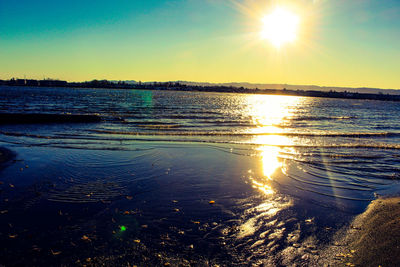 Scenic view of sea against sky during sunset