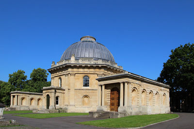 View of historical building against clear blue sky