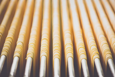 Full frame shot of spaghetti drying in factory