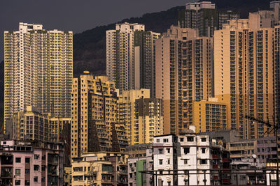 Modern buildings in city against sky