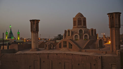 Panoramic view of old mosquee and trafitional building against sky in persia