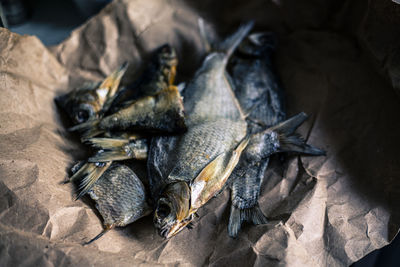 Fried fish on paper