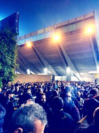 Group of people looking at music concert