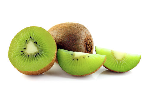 Close-up of fruits against white background