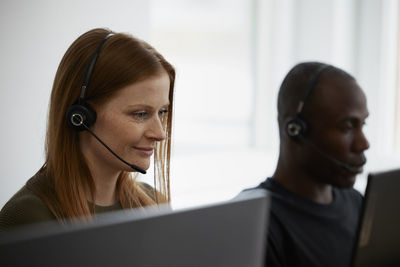 Diverse call center employees at work