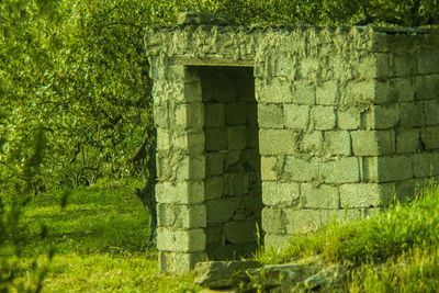 Built structure on grassy landscape