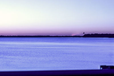 Scenic view of sea against sky during winter