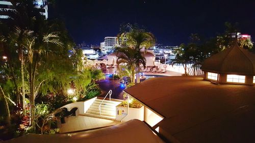 View of swimming pool at night