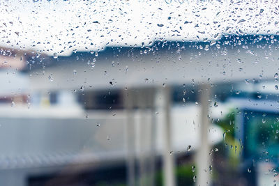 Full frame shot of wet window in rainy season