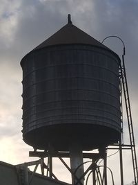 Low angle view of water tower against sky