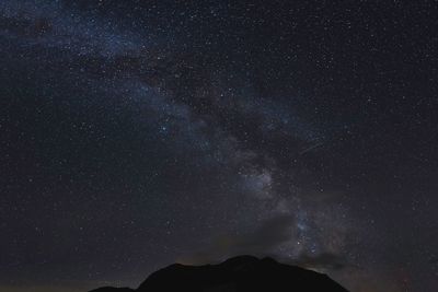 Low angle view of stars in sky at night