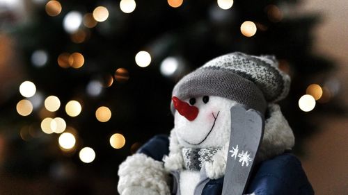 Close-up of hat with illuminated christmas lights