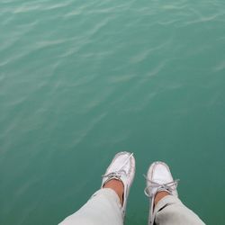 Low section of man over water