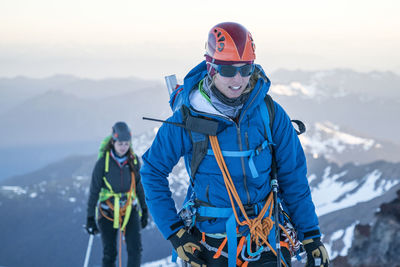 Panoramic view of people on mountain during winter