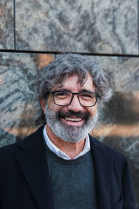 Portrait of young man standing outdoors