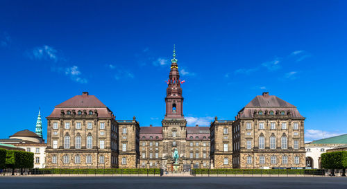 View of historic building against blue sky