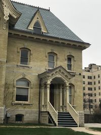 Low angle view of old building against sky