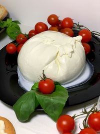 Close-up of tomatoes in plate on table