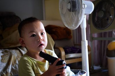 Portrait of boy at home