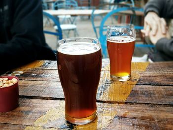 Close-up of beer glass on table