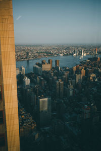 High angle view of buildings in city against sky