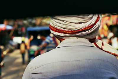 Rear view of man wearing hat