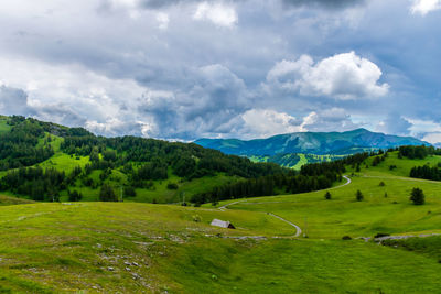 A picturesque landscape view of the french alps mountains on a cloudy summer day