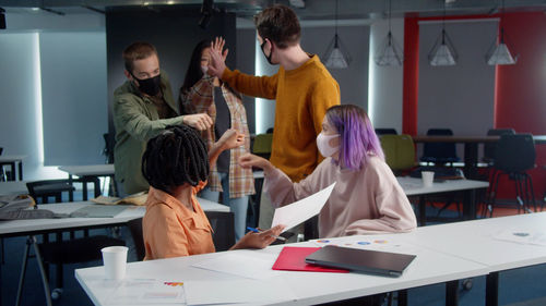 Business colleagues working in office