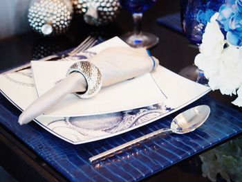 Close-up of place setting on table in restaurant