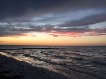 Scenic view of sea at sunset