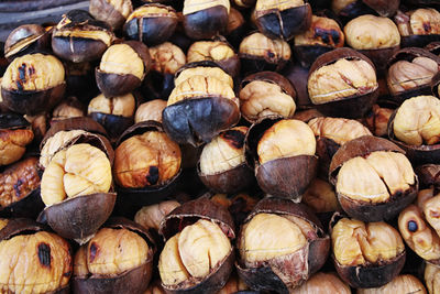 Close-up of roasted chestnut at market