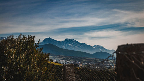 Scenic view of snowcapped mountains against sky