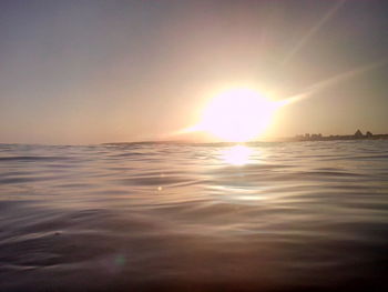 Scenic view of sea at sunset