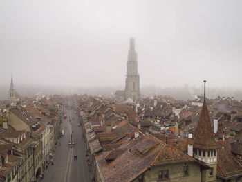 High angle view of buildings in city against sky