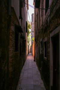 Narrow alley along buildings