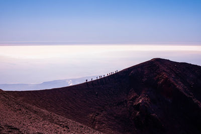 Scenic view of mountain against sky during sunset