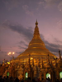 Low angle view of pagoda against sky at night