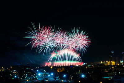 Sky illumed with fire crackers at night