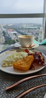 Close-up of breakfast served on table