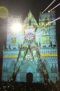 Low angle view of illuminated buildings at night