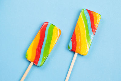Colorful candies, lollypop on the color background